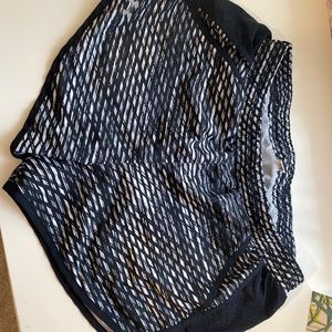 Under Armour womens black and white nylon shorts with grey lining